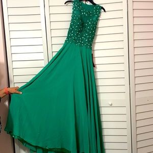 Gorgeous emerald green, full length prom dress. Jewel detailing, cut out in back
